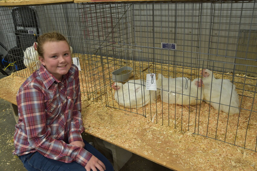 Kaylie Logsdon, reserve grand champion, sold her prize pen of three chickens for $3,520, purchased by Civitas Resources.
